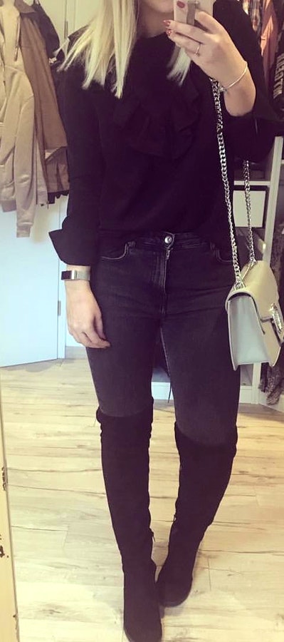 Black long-sleeved shirt, black denim jeans, and black. Pic originally posted by caroinlove91