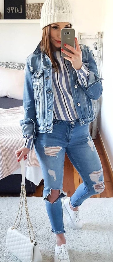 Blue denim jacket + Blue and white strapless shirt + Ankle length blue jeans + white sneakers, handbag and cap. Pic originally posted by me__lanie__