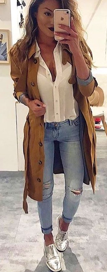 Brown button-up coat with white button-up shirt.