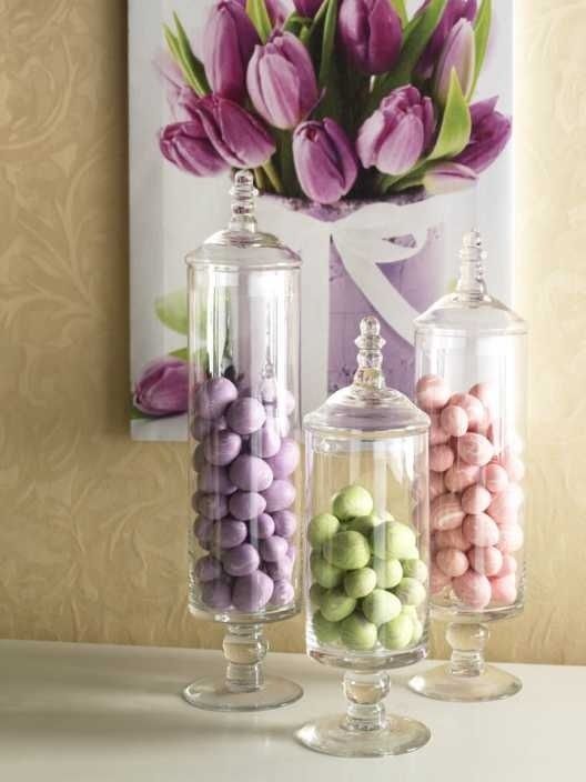 Different color candies in jars