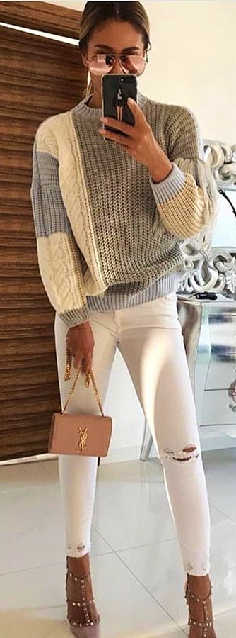 Grey and white crochet sweater and white skinny jeans holding a brown Yves Saint Laurent purse. Pic originally posted by fashion4perfection