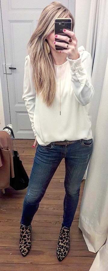 White crew-neck long-sleeved shirt and black-washed denim pants. Pic originally posted by le_chatnonyme