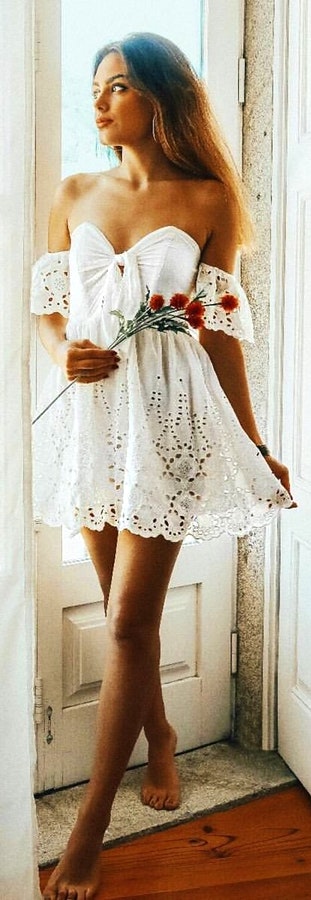 White sweetheart cold-shoulder sleeved dress. Pic originally posted by ineescosta