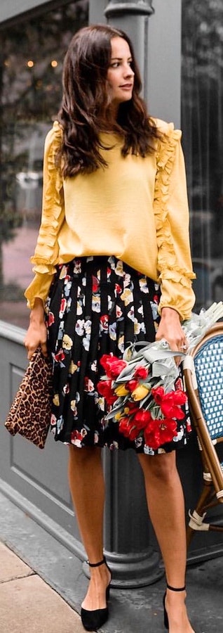 Yellow long-sleeved shirt + Black floral skirt + Black high heels. Pic originally posted by themilleraffect