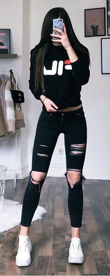 Black Long Sleeved Shirt + Distressed Black Jeans.