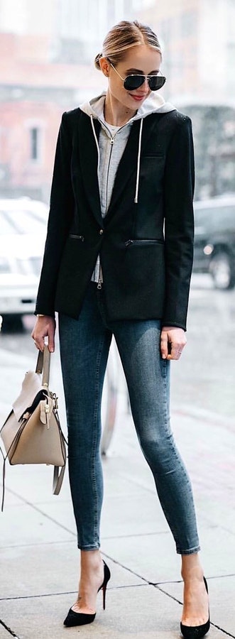 Black blazer and blue skinny jeans.