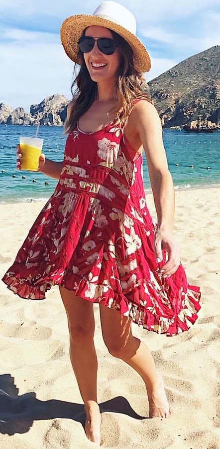 Woman wearing red and white dress.