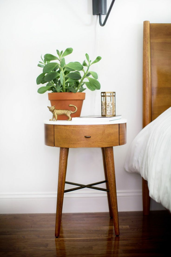 Green room plant on bedside table
