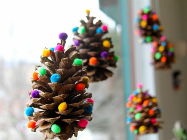 #Christmas #Crafts #Kids Pinecone decorated with colorful felt balls