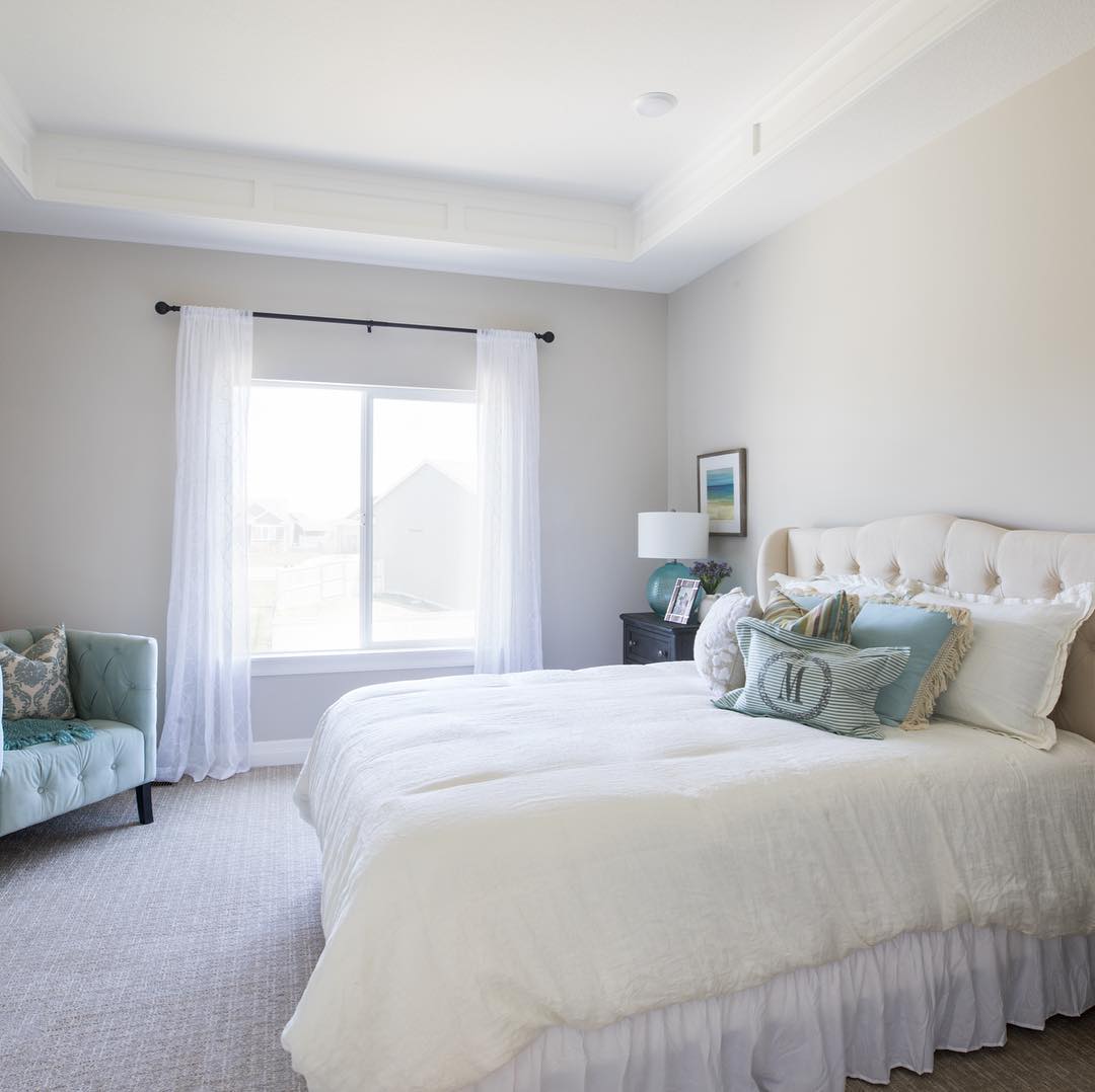 This Master Bedroom suite boasts a chic and elegant design.  Pic by paulgrayhomes