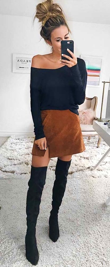 Women's black off-shoulder long-sleeved shirt and brown skirt.