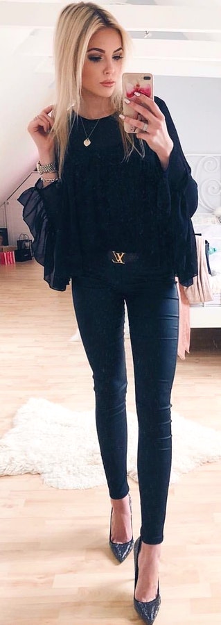 Black long-sleeve top.