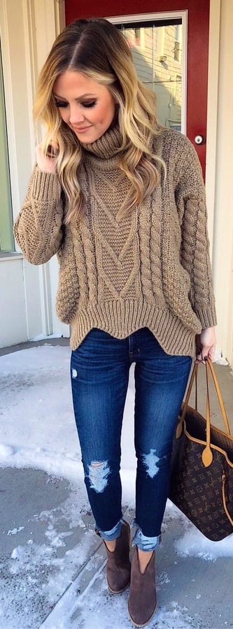 Brown cable-knitted sweater.
