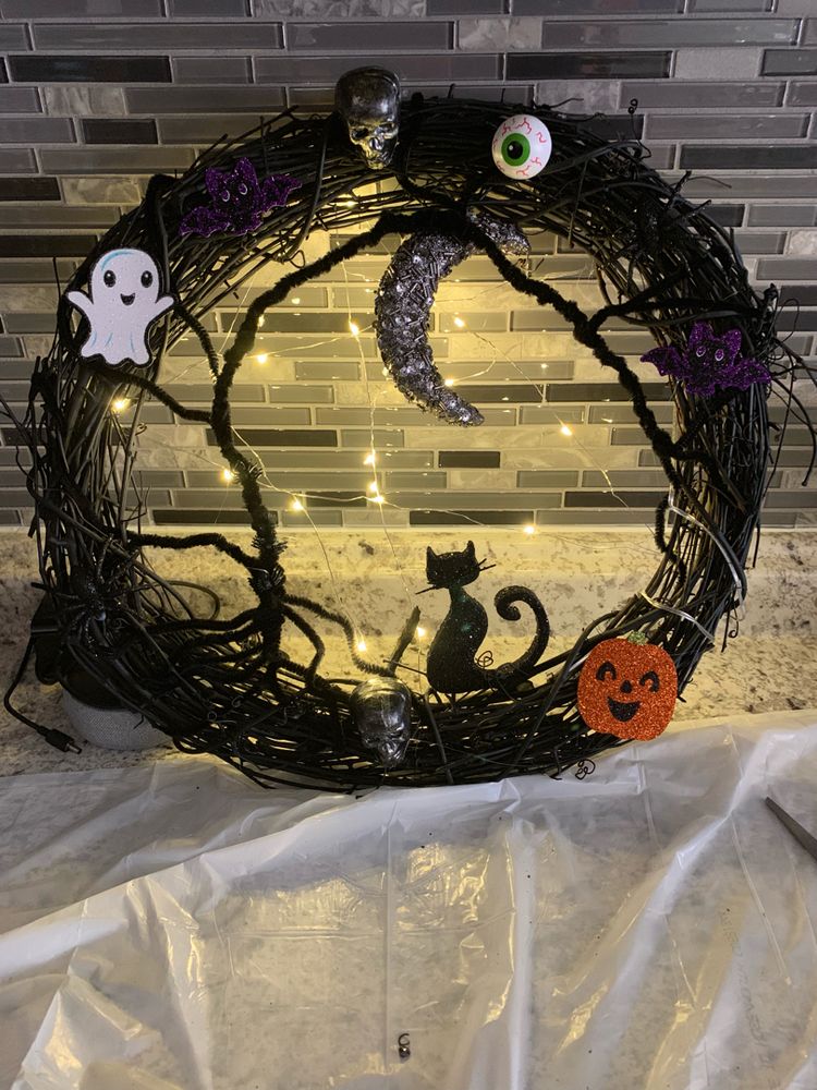 October decor with a Halloween wreath.