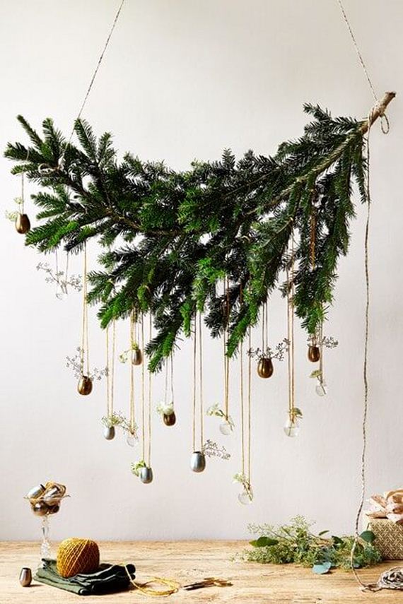 A large pine-cone branch which can be decorated above dinner table. Christmas Table Decorations & Centerpieces