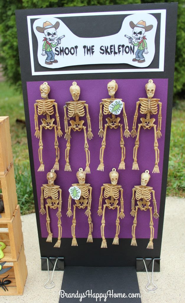 Hang fake skeletons on a board and let kids shoot.