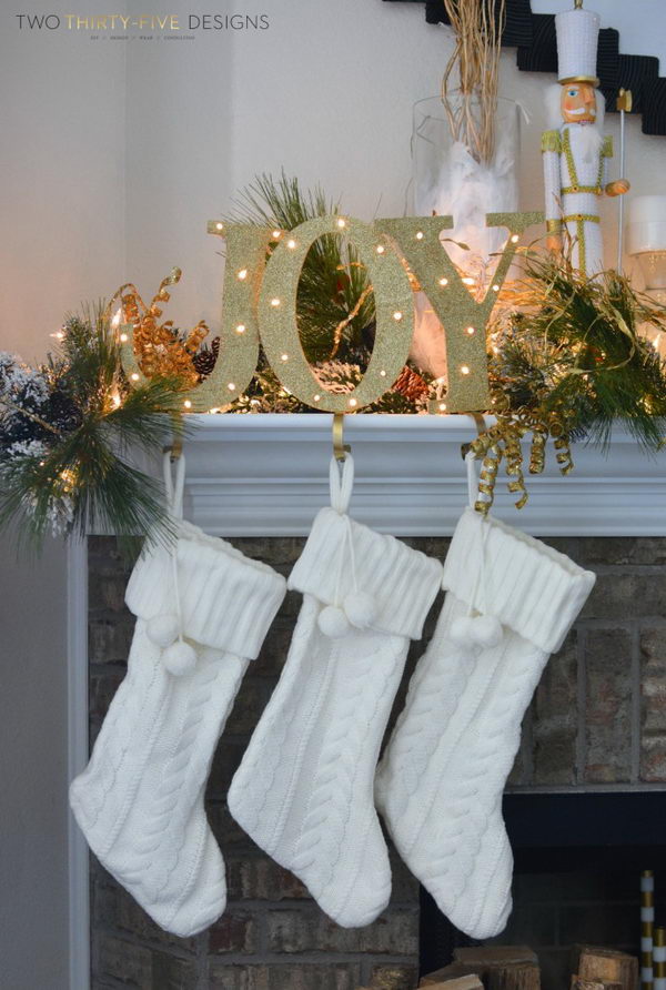 Light Up Joy Stocking Holders.