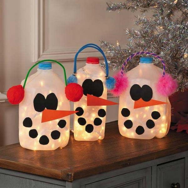 Milk jug snowmen lanterns.