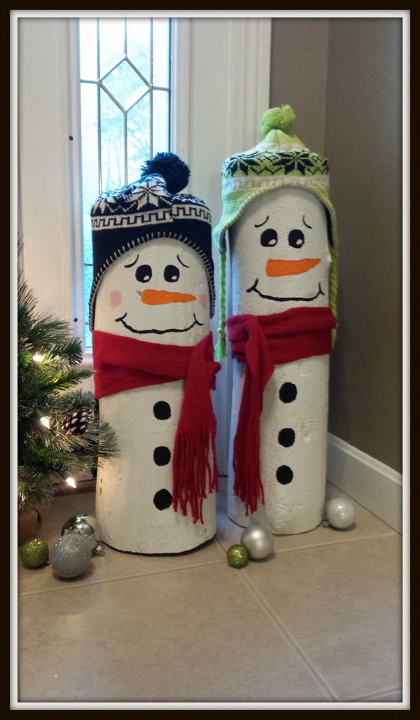 The pair of snowmen may be made of logs.