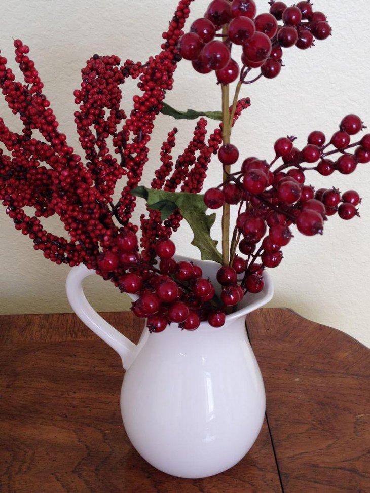 Beautiful White Vase with Cranberry Arrangement.