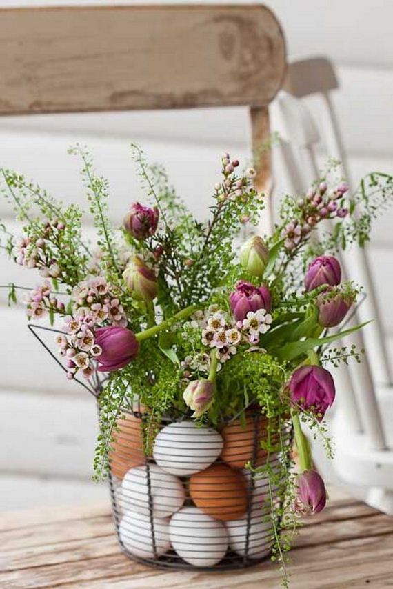 Easter Centerpiece with Eggs and Flowers.