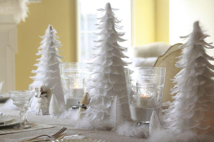 White Christmas Table Décor with Feathered Christmas Tree Centerpieces.