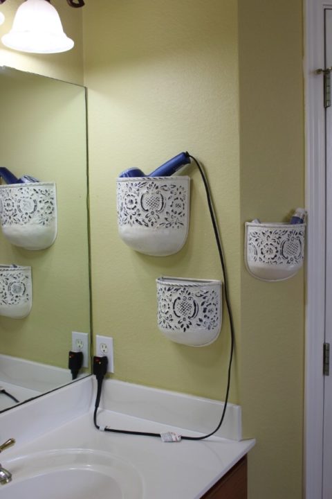 Plant Holders Repurposed in Bathroom.