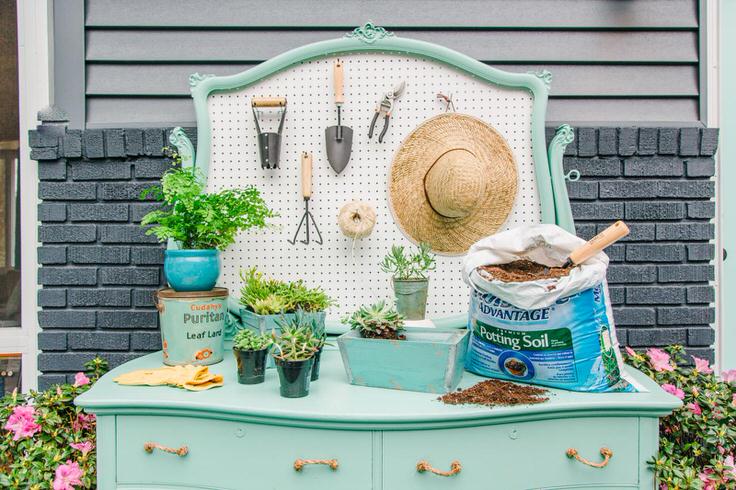 An old dresser into a potting table.