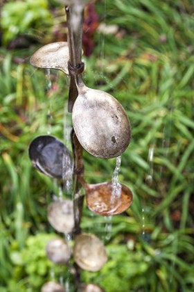 DIY rain chain using old spoons.