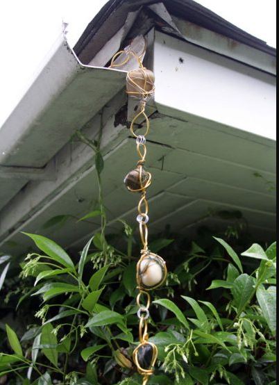 Downspout rain chains are made with wire wrapped.