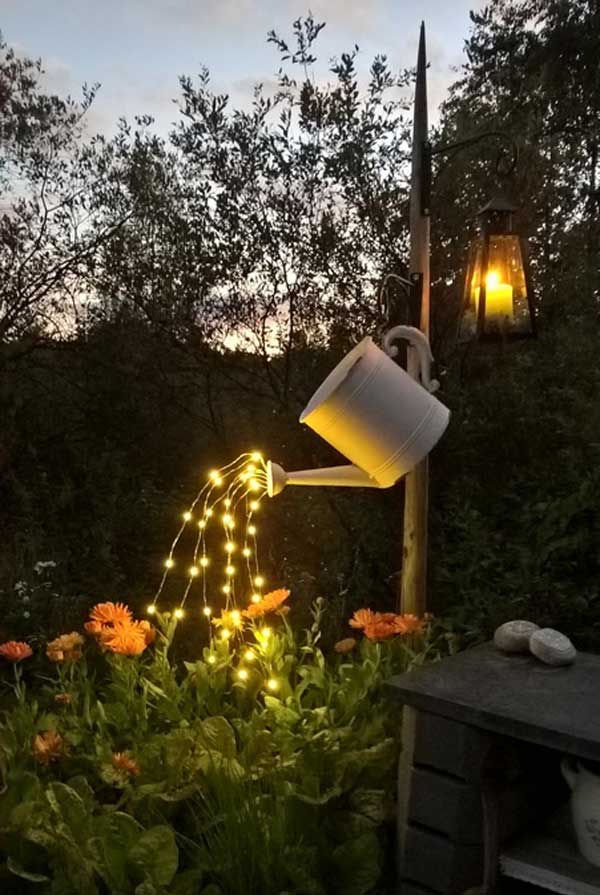 Repurposed Watering Can.