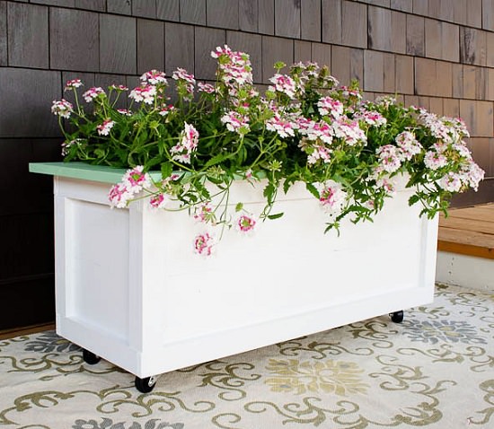 Wooden Outdoor Planter On Wheels.