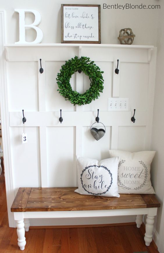 DIY Farmhouse Entryway Bench and Whitewashed Board Wall With Coats.