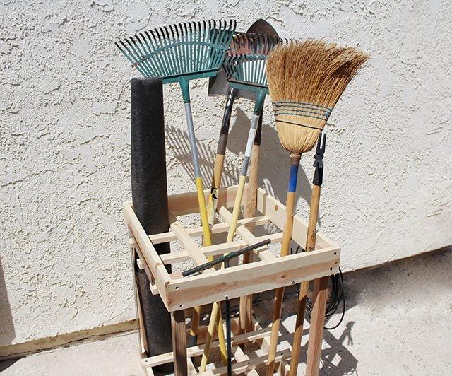 DIY garden tool rack idea.