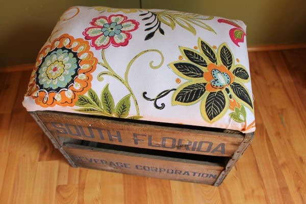 Make An Ottoman From A Crate.