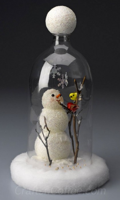 Make a Snowman Cloche From a Soda Bottle.