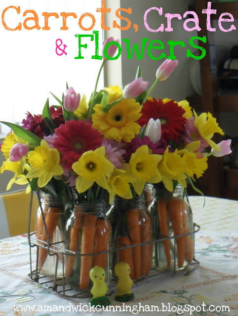 Carrots, Crate and Flowers.