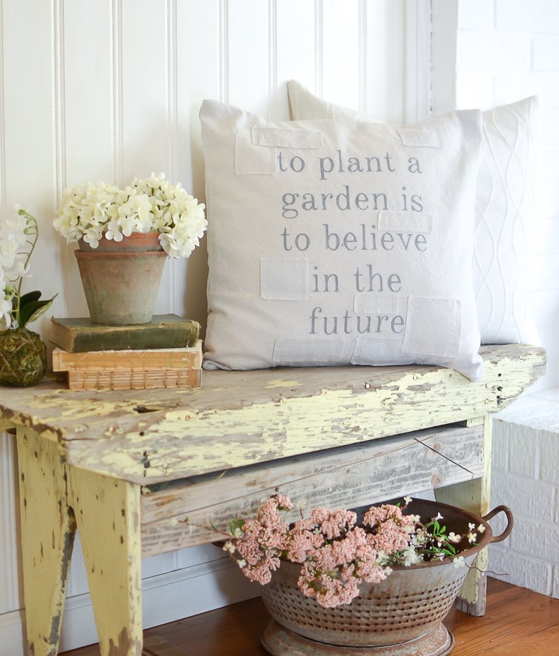 A rustic, weathered bench is perfect for porch decor.