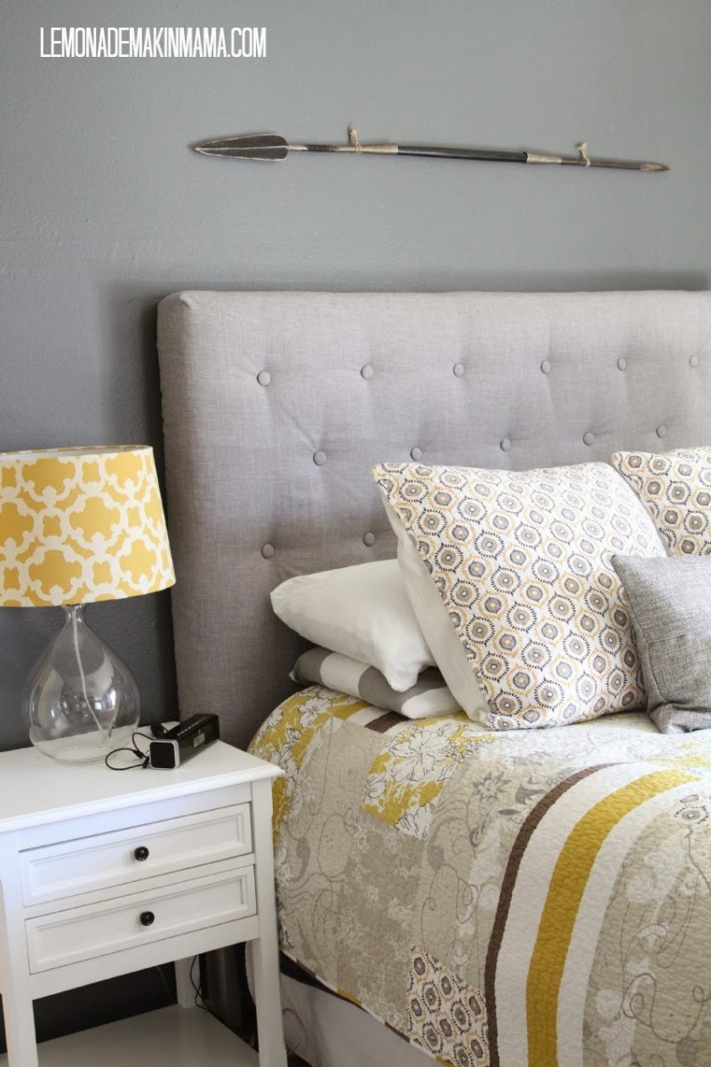Buttoned Fabric-Based Headboard.