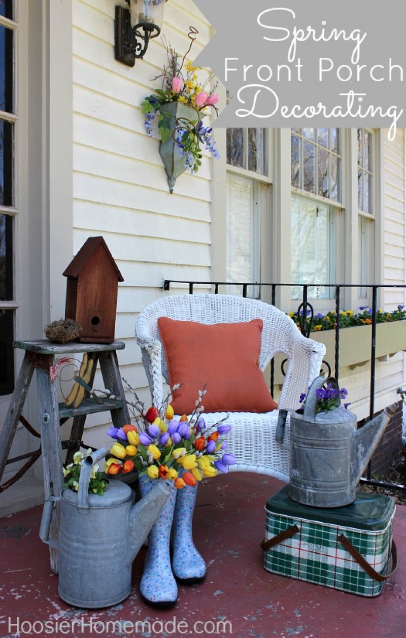 Galvanized watering cans along with the rainboots.