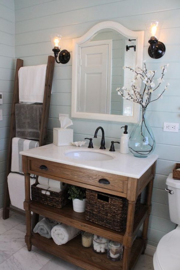 Ladder Towel Rack And Woven Baskets.