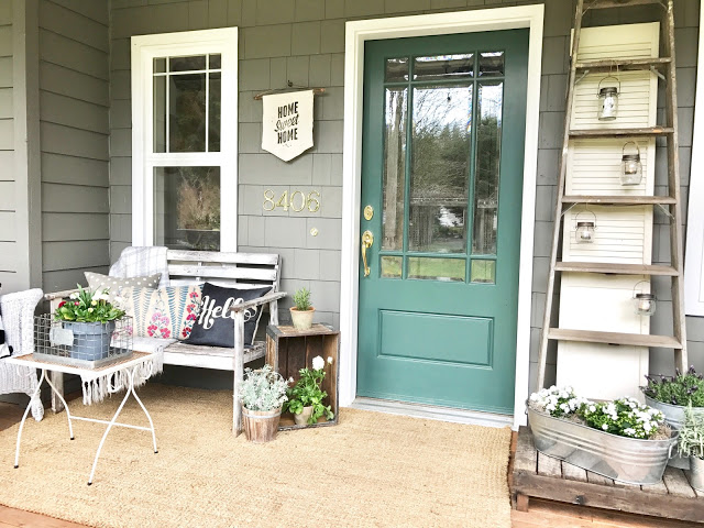 Porch is so welcoming and inviting.