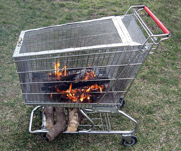 Portable Fire Pit With Built in Log Storage Rack.