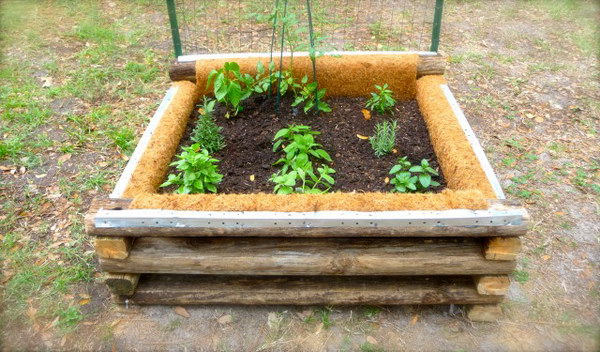 Raised Garden Bed With Weed Cloth And Coconut Fiber.