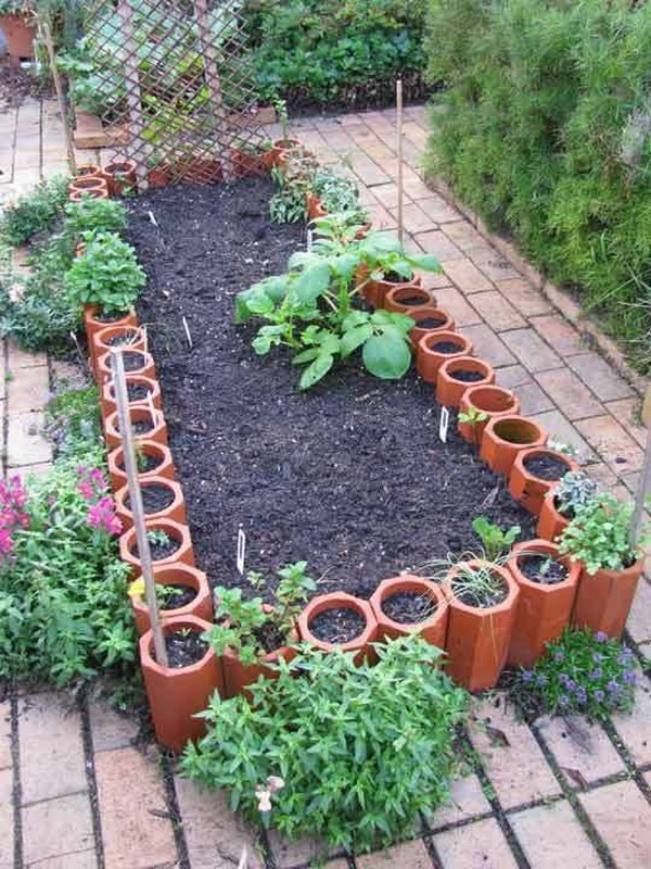 Raised Garden Beds from Old Terracotta Pipes.