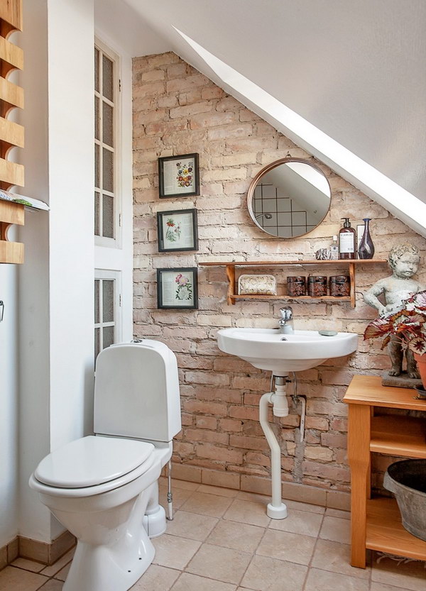 Stylish Small Bathroom With Brick Wall.