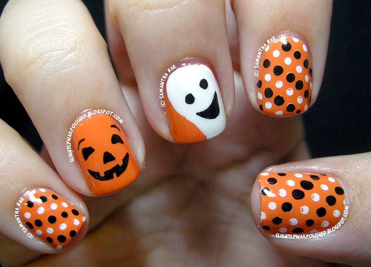 A Happy Pumpkin and Ghost Nail Art.