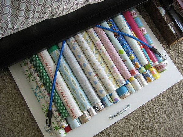 Bungee Cords Board for Wrapping Paper Storage Under the Bed.