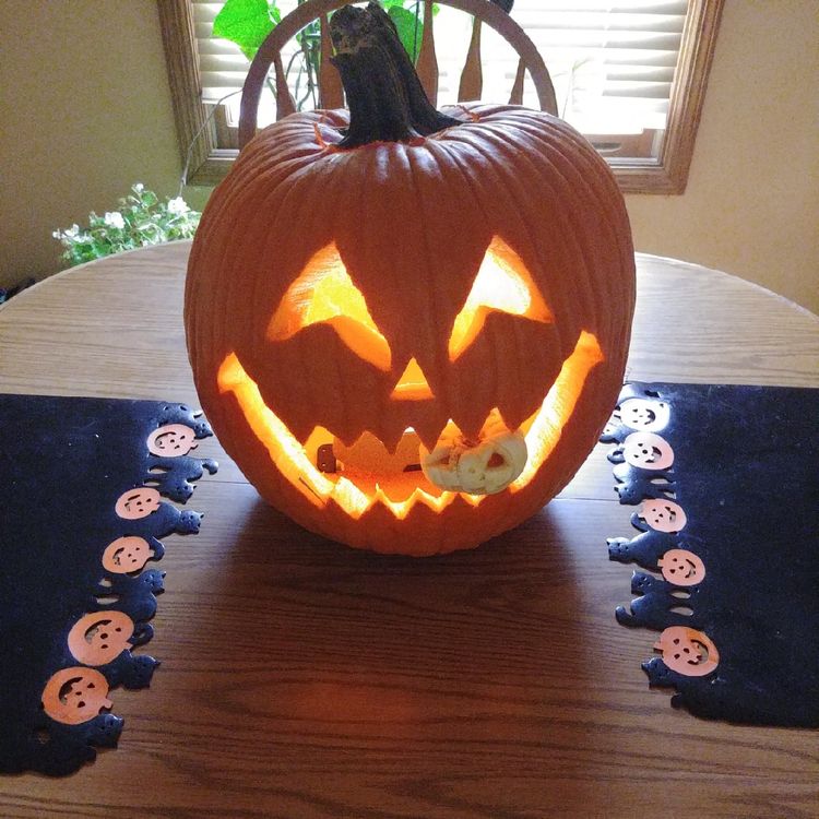 Lovely carved pumpkin.