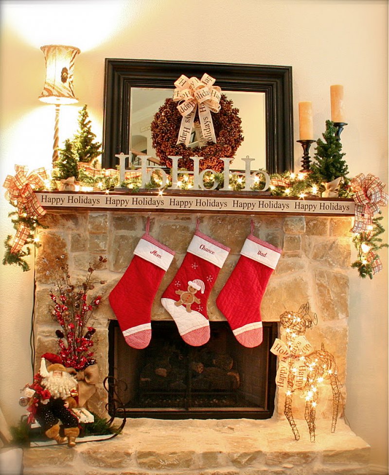 Mantel with Pine Cone Wreath.